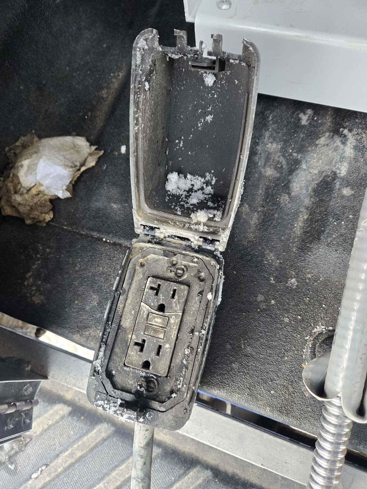 Corroded outdoor GFCI receptacle removed from service by Hi-Energy Electrical Services