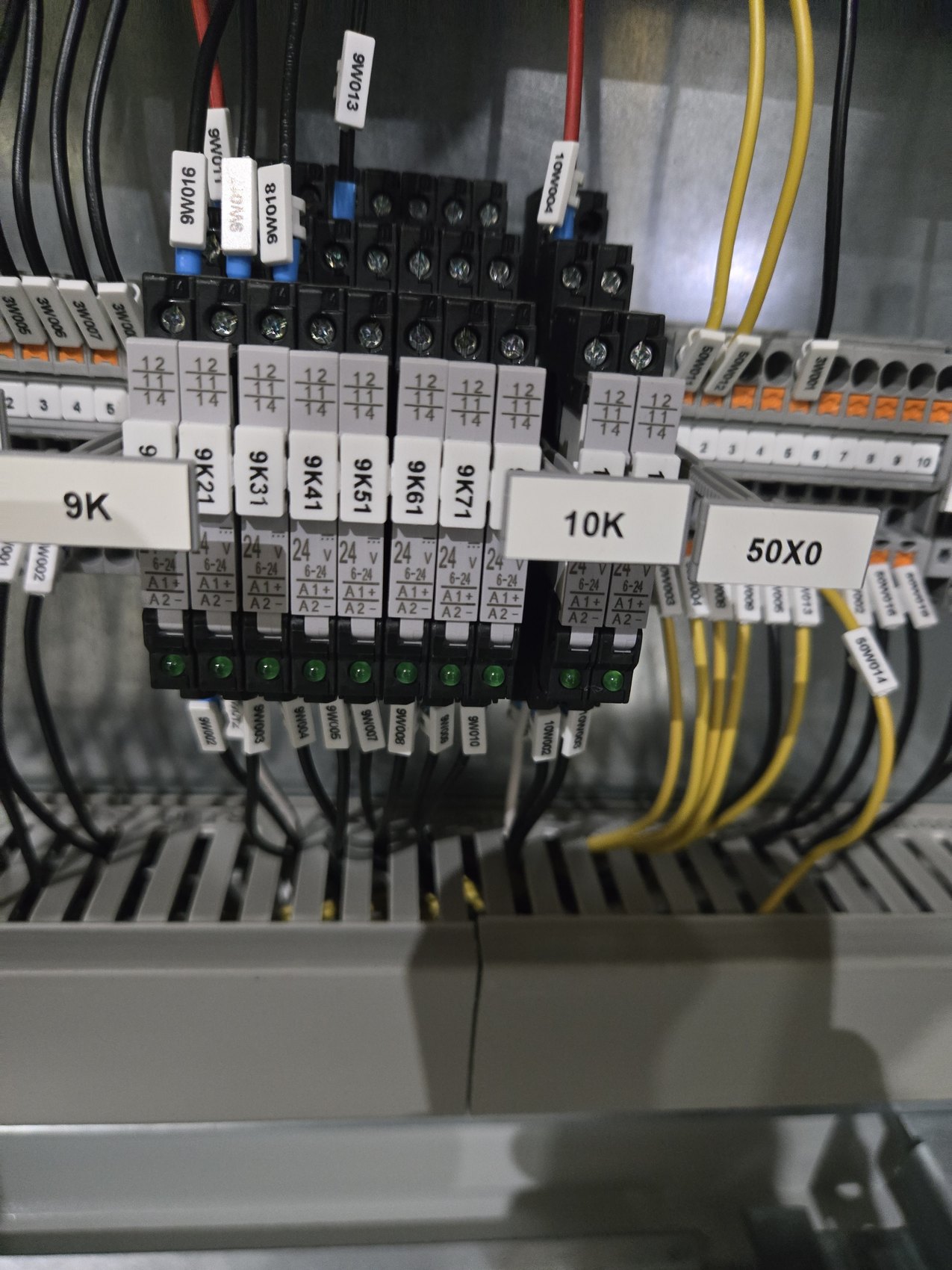 Relay bank tagged and wired in a control cabinet by Hi-Energy Electrical Services